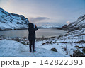 Tromso Norway, woman tourist taking photo of winter nature landscape at Grotfjord 142822393