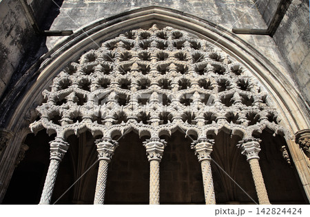 Intricate architecture of Batalha Monastery in Portugal, a UNESCO World Heritage site Intricate architecture of Batalha Monastery in Portugal, a UNESCO World Heritage site 142824424