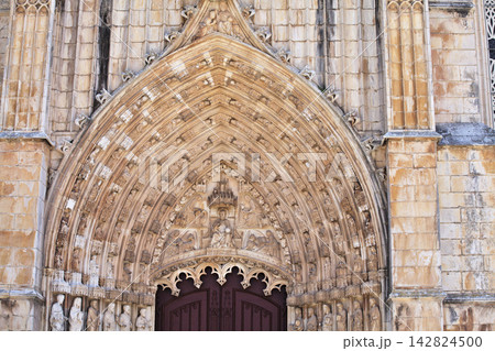 Intricate stone carvings at Batalha monastery entrance in Portugal Intricate stone carvings at Batalha monastery entrance in Portugal 142824500