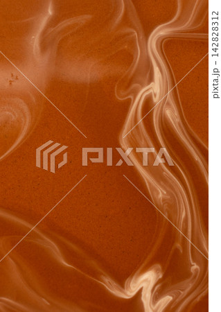 Smooth warm chocolate wave pattern, macro photography Smooth warm chocolate wave pattern, macro photography 142828312