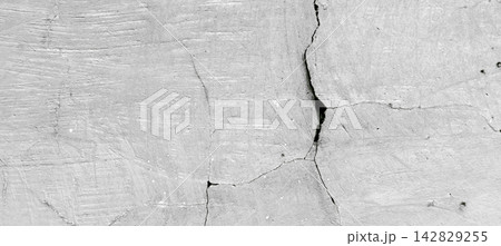 Cracked gray concrete wall texture Cracked gray concrete wall texture 142829255