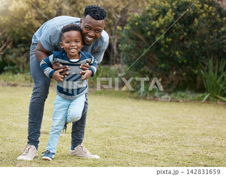 Hug, father or portrait of child in park for support in nature for care, safety or bonding together to relax. Smile, love or single parent man with kid for security, playing or growth in black family Hug, father or portrait of child in park for support in nature for care, safety or bonding together to relax. Smile, love or single parent man with kid for security, playing or growth in black family 142831659