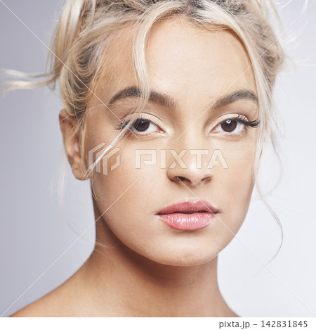 Woman, serious and skincare portrait in studio, cosmetics and clear skin on white background. Female person, makeup and dermatology wellness for beauty, facial treatment and pride for hydration Woman, serious and skincare portrait in studio, cosmetics and clear skin on white background. Female person, makeup and dermatology wellness for beauty, facial treatment and pride for hydration 142831845
