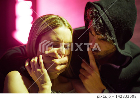 Woman, criminal and hand for grabbing, kidnapping and anxiety for scary man, violence and danger. Crime, female person and thief or gangster for with finger for silence from stalker or abduction Woman, criminal and hand for grabbing, kidnapping and anxiety for scary man, violence and danger. Crime, female person and thief or gangster for with finger for silence from stalker or abduction 142832608
