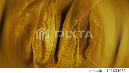 Defocused color ink. Yellow particles flow. Pigment bright golden water fluid glitter floating on abstract acrylic art background. Defocused color ink. Yellow particles flow. Pigment bright golden water fluid glitter floating on abstract acrylic art background. 142833083