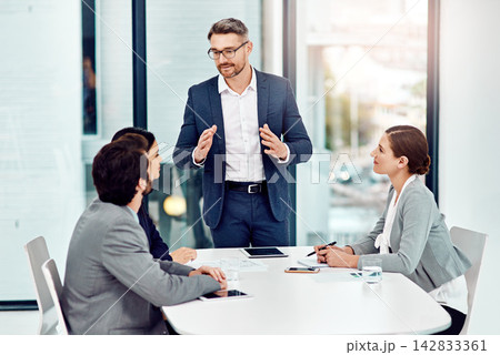 Businessman, meeting and discussion with team in office for planning, brainstorming and ideas on project deal for client. Group, man and staff with support for teamwork of work performance progress 142833361