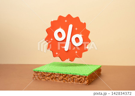 A plot of land and a discount percentage sticker. Promotional sale of land plots. Concept of real estate marketing and affordable property investment deals. Market opportunity. A plot of land and a discount percentage sticker. Promotional sale of land plots. Concept of real estate marketing and affordable property investment deals. Market opportunity. 142834372