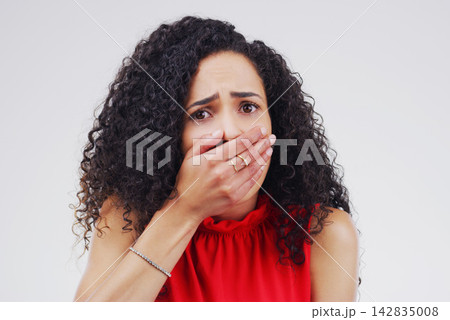 Spanish woman, portrait and shocked for news, announcement and secret in studio on white background. Girl, surprise and wtf facial expression with hand on mouth for gossip, information or crazy story 142835008