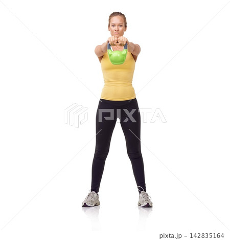 Workout, portrait and woman exercise with kettlebell swing for muscle growth, arm strength or bodybuilding. Fitness studio, gym routine or athlete training for weightlifting goals on white background Workout, portrait and woman exercise with kettlebell swing for muscle growth, arm strength or bodybuilding. Fitness studio, gym routine or athlete training for weightlifting goals on white background 142835164