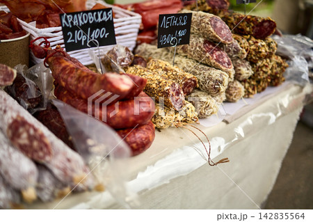 Assorted Cured Sausages and Deli Meats Display at Traditional Market Assorted Cured Sausages and Deli Meats Display at Traditional Market 142835564