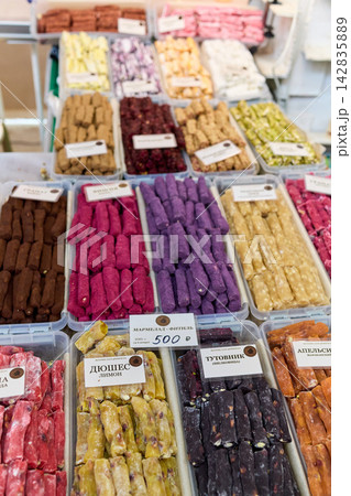 MOSCOW, RUSSIA - MAY 24, 2026: Colorful Churchkhela - Traditional Georgian Nut Candy in Various Flavors at Market MOSCOW, RUSSIA - MAY 24, 2026: Colorful Churchkhela - Traditional Georgian Nut Candy in Various Flavors at Market 142835889