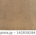 明るいブラウンの塗り壁・モルタル調テクスチャ背景素材 142838284
