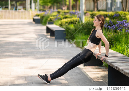 Waist up of a pretty young caucasian woman in headphones 142839441