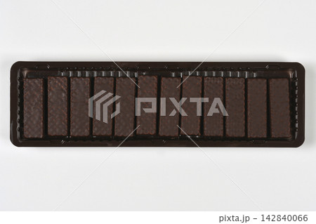 Chocolate wafer bars in a plastic container Chocolate wafer bars in a plastic container 142840066