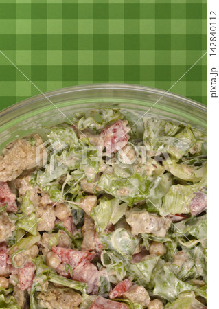 Fresh salad with fried seitan vegetables and creamy dressing Fresh salad with fried seitan vegetables and creamy dressing 142840112