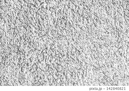 Macro of white microfiber bath towel, soft fluffy fabric, absorbent material texture background Macro of white microfiber bath towel, soft fluffy fabric, absorbent material texture background 142840821