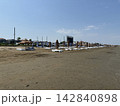 View of the beach. Bungalow umbrellas sun loungers recreation area. Sea and sand. 142840898