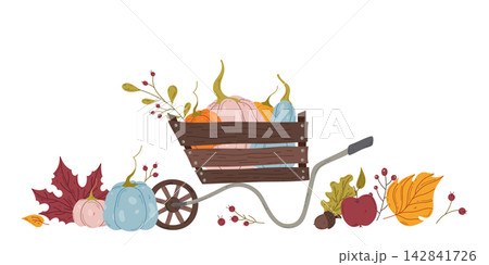 Autumn Harvest Wheelbarrow with Pumpkins 142841726