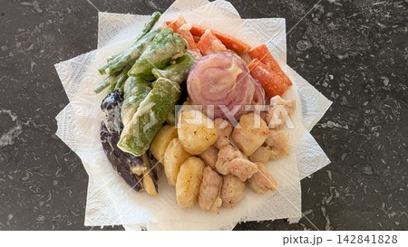 Colorful homemade vegetable and chicken tempura from top view Colorful homemade vegetable and chicken tempura from top view 142841828