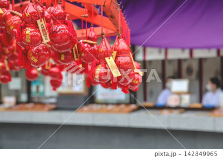 Japan April 29 2026 Red gourd charms hanging at shrine Japan April 29 2026 Red gourd charms hanging at shrine 142849965