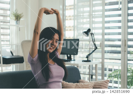 Woman enjoying life at home, promoting healthy eating, wellness, and a balanced lifestyle. Concept of natural nutrition, mindfulness, and modern healthy living. 142851690
