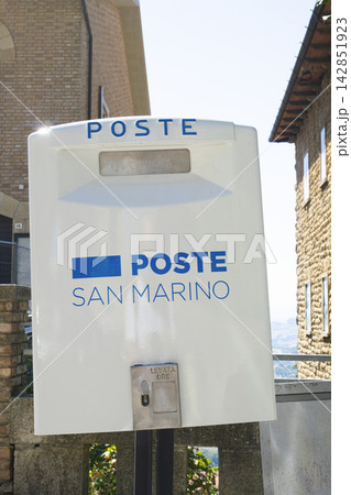 San Marino post box mounted on a rough stone wall. 142851923