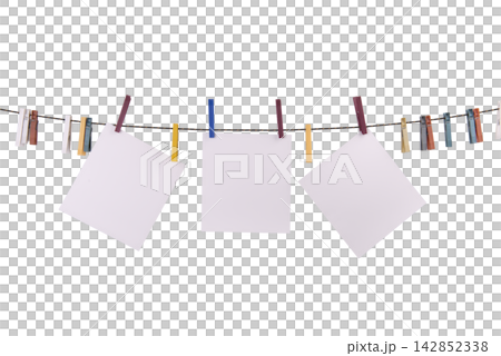 Three blank white squares of paper are hanging on a clothesline with colorful clothespins Three blank white squares of paper are hanging on a clothesline with colorful clothespins 142852338