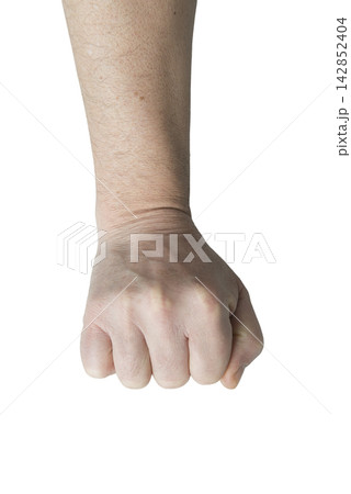 A close-up shot shows a human fist clenched. 142852404