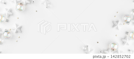 Festive Christmas ornaments on a white background. Festive Christmas ornaments on a white background. 142852702