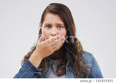 Woman, portrait and shocked or omg for news, announcement and secret in studio on white background. Girl, surprise and wtf facial expression with hand on mouth for gossip, information and crazy story 142855935