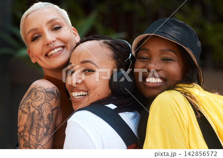 Friends, girls and hug outdoor with portrait for bonding, funny joke or streetwear with support in nature. People, women and happy face in town with edgy style, trendy clothes and confident embrace Friends, girls and hug outdoor with portrait for bonding, funny joke or streetwear with support in nature. People, women and happy face in town with edgy style, trendy clothes and confident embrace 142856572