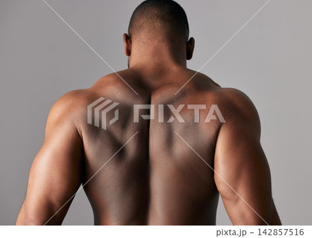 Studio, back and muscle of man, strong and gym for fitness with training, practice and exercise in sport. White background, healthy and spine of person, bodybuilder and workout for athlete and body Studio, back and muscle of man, strong and gym for fitness with training, practice and exercise in sport. White background, healthy and spine of person, bodybuilder and workout for athlete and body 142857516