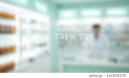 Blurred pharmacy interior showing male pharmacist standing behind counter near modern medicine shelves inside empty retail drugstore serving as defocused medical shopping background Blurred pharmacy interior showing male pharmacist standing behind counter near modern medicine shelves inside empty retail drugstore serving as defocused medical shopping background 142859378