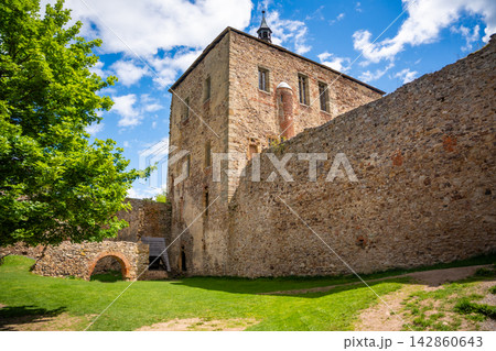 Interior courtyard and stone ruins of Tocnik Castle overlooking the Bohemian countryside. Medieval heritage and preservation concept 142860643