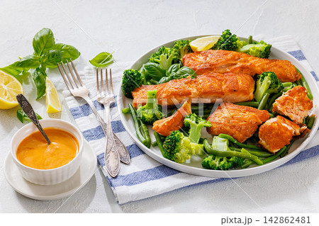 Grilled salmon with steamed green beans, broccoli Grilled salmon with steamed green beans, broccoli 142862481