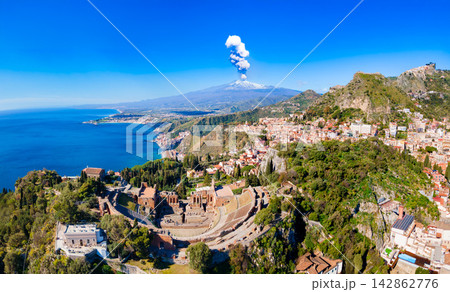 Taormina Ancient Theatre, Etna volcano aerial view, Sicily Taormina Ancient Theatre, Etna volcano aerial view, Sicily 142862776