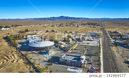 Aerial Alien Attraction Roadside Desert Highway in Baker California 142864577