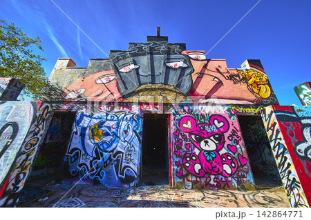 Abandoned Lake Dolores Water Park Graffiti Building Front in Vibrant Sunlight Abandoned Lake Dolores Water Park Graffiti Building Front in Vibrant Sunlight 142864771