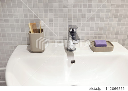 Ceramic mosaic tiles wall background in renovated bathroom. 142866253