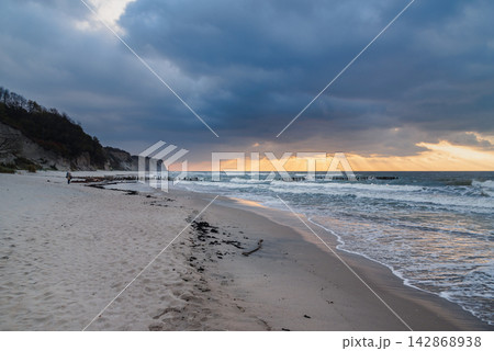 Donskoye beach at sunset of Baltic Sea. Kaliningrad region, Russia Donskoye beach at sunset of Baltic Sea. Kaliningrad region, Russia 142868938