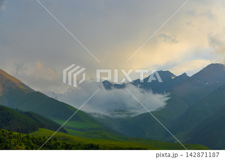 Majestic Mountain Landscape Under Dramatic Sky 142871187