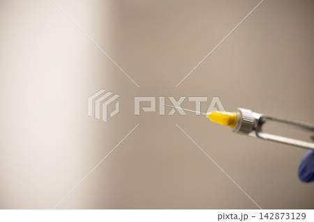 Metal dental crowns with pin placement prosthetic restoration close up Metal dental crowns with pin placement prosthetic restoration close up 142873129