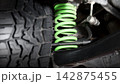 Car suspension and drive shaft. Structure of EV car spare parts. Such as Front or Rear suspension Shock absorber suspension Brake. Elements of the suspension and Chassis structure. Car service repair. 142875455