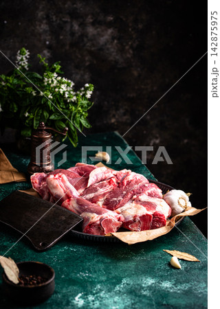 Raw leg of lamb, ready to cook Raw leg of lamb, ready to cook 142875975