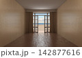 Empty Modern Interior Room with Open French Doors to Sunny Beach and Ocean 142877616