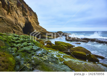Laguna Beach Cave and Mossy Tidepools at Thousand Steps Beach Ocean Cove 142878956