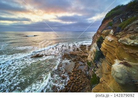 Sunset Cliffs California Sandstone Beach and Ocean at Golden Hour 142879092