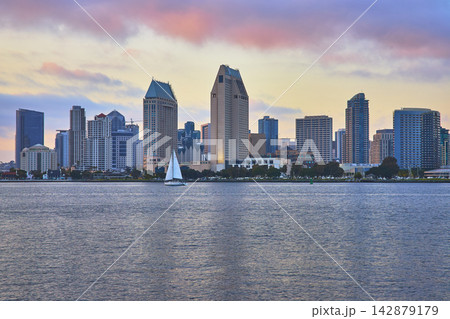 San Diego Skyline and Sailboat on Bay at Golden Hour California Waterfront View 142879179