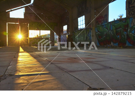 Sunburst Through Abandoned Graffiti Covered Goldome Mill in Mojave California Sunburst Through Abandoned Graffiti Covered Goldome Mill in Mojave California 142879215