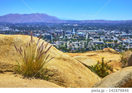 Granite Boulders Wild Grasses and San Bernardino Cityscape from Mt Rubidoux Trail 142879848